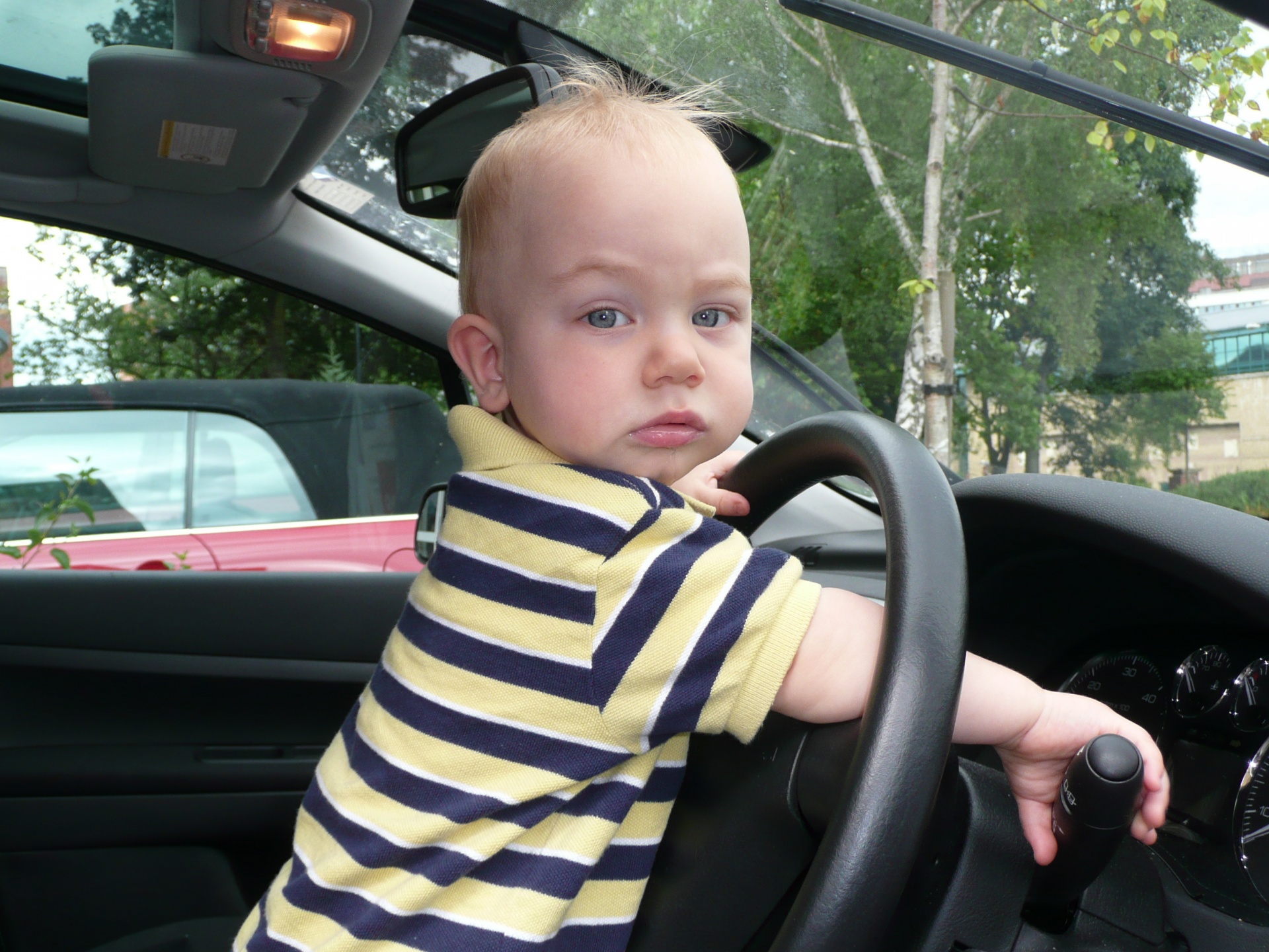 little-2-years-old-boy-drives-a-car-1454883614pCw